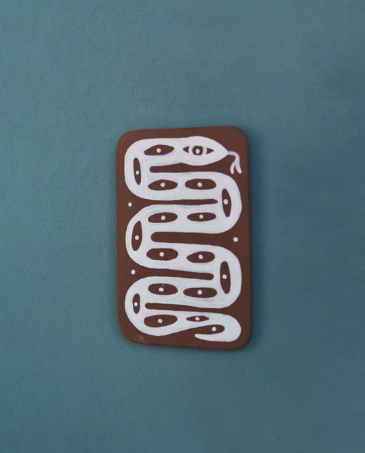 Perro y Arena - La Serpiente Albina