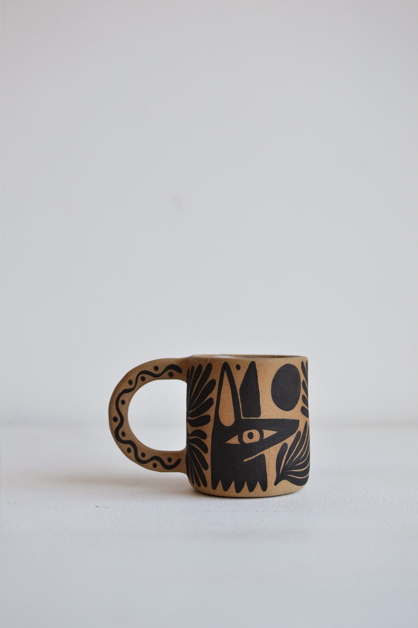 Perro y Arena Taza 6oz.