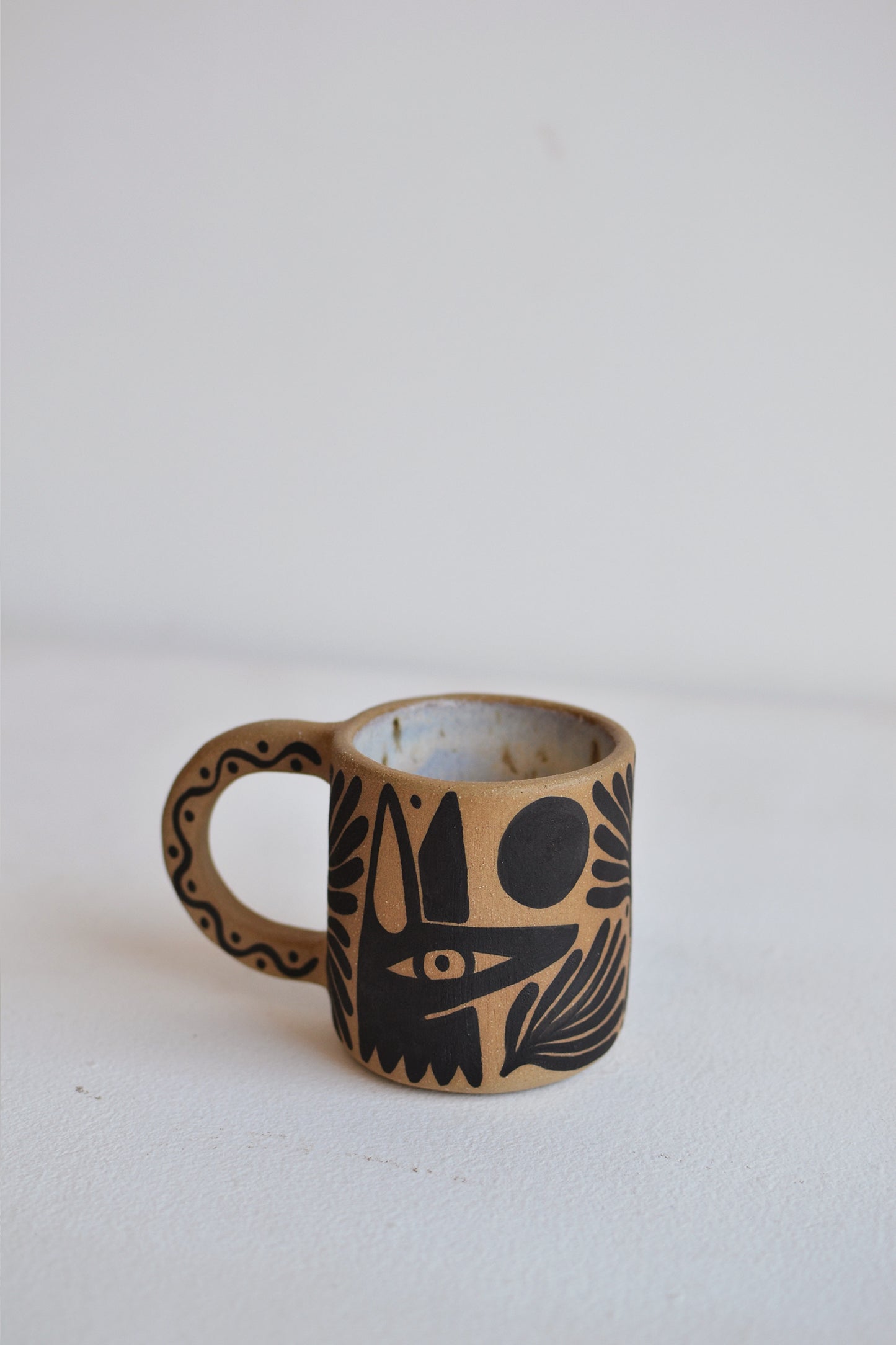 Perro y Arena Taza 6oz.
